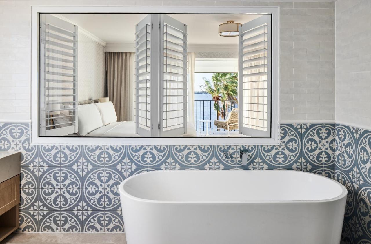 The Beachcomber Hotel & Resort, Ascend Hotel Collection Toukley Exterior photo Bathroom mirror